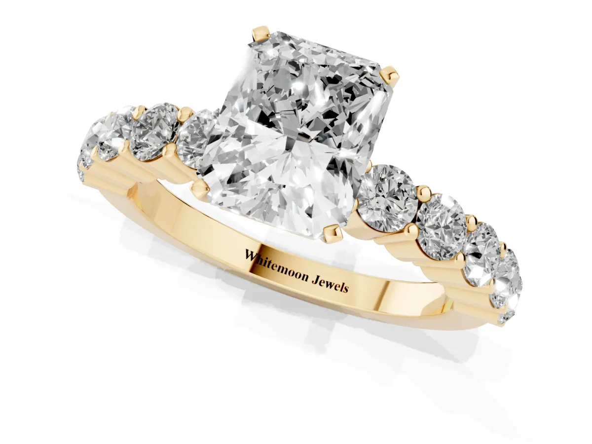 Radiant Cut Diamond Solitaire Ring with Shared Prong Round Side Stones Yellow gold