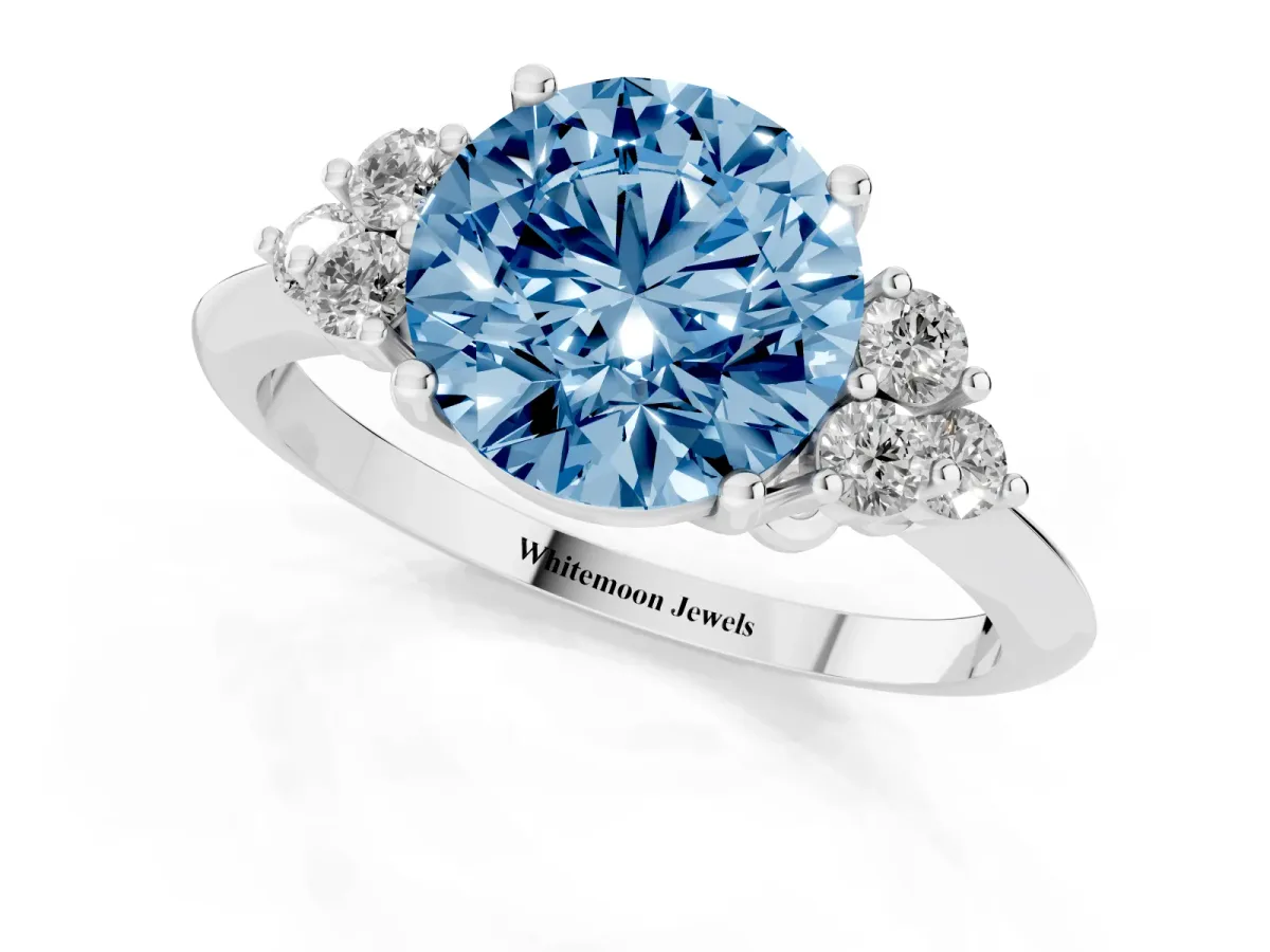 Fancy Blue Round Cut Cut Diamond Cluster Ring with Solitaire Band and Four-Prong Setting Silver