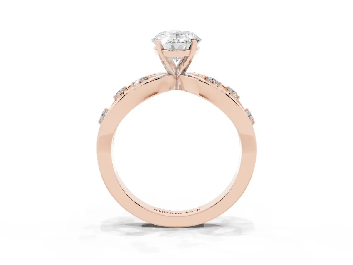 Oval Cut Cut Solitaire Diamond with Side Stones on Criss-Cross Band and Four-Prong Setting Rose gold