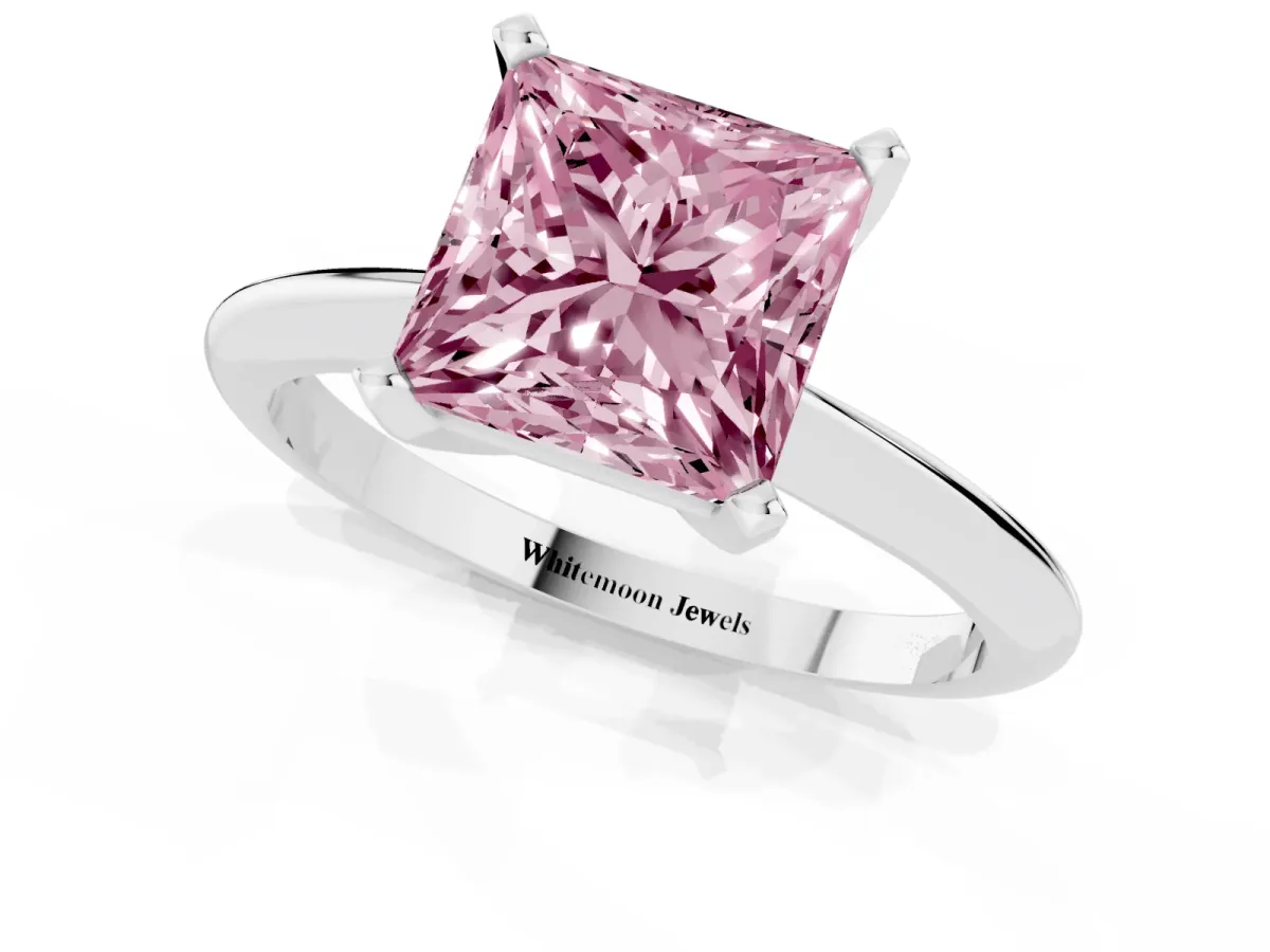 Fancy Pink Princess Cut Cut Solitaire Ring with Four-Prong Setting on a Classic Band Silver