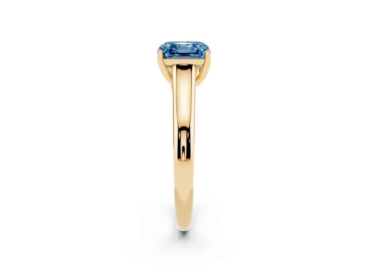 Fancy Blue Asscher Cut Solitaire Engagement Ring with Tapered Band and Four-Prong Setting Yellow gold