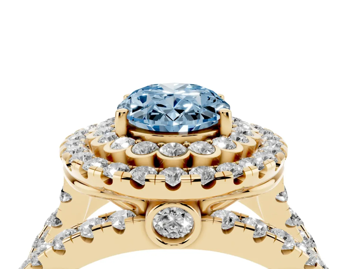 Fancy Blue Oval Cut Diamond Double Halo Ring with Round Pavé Split Shank and Prong Setting Yellow gold