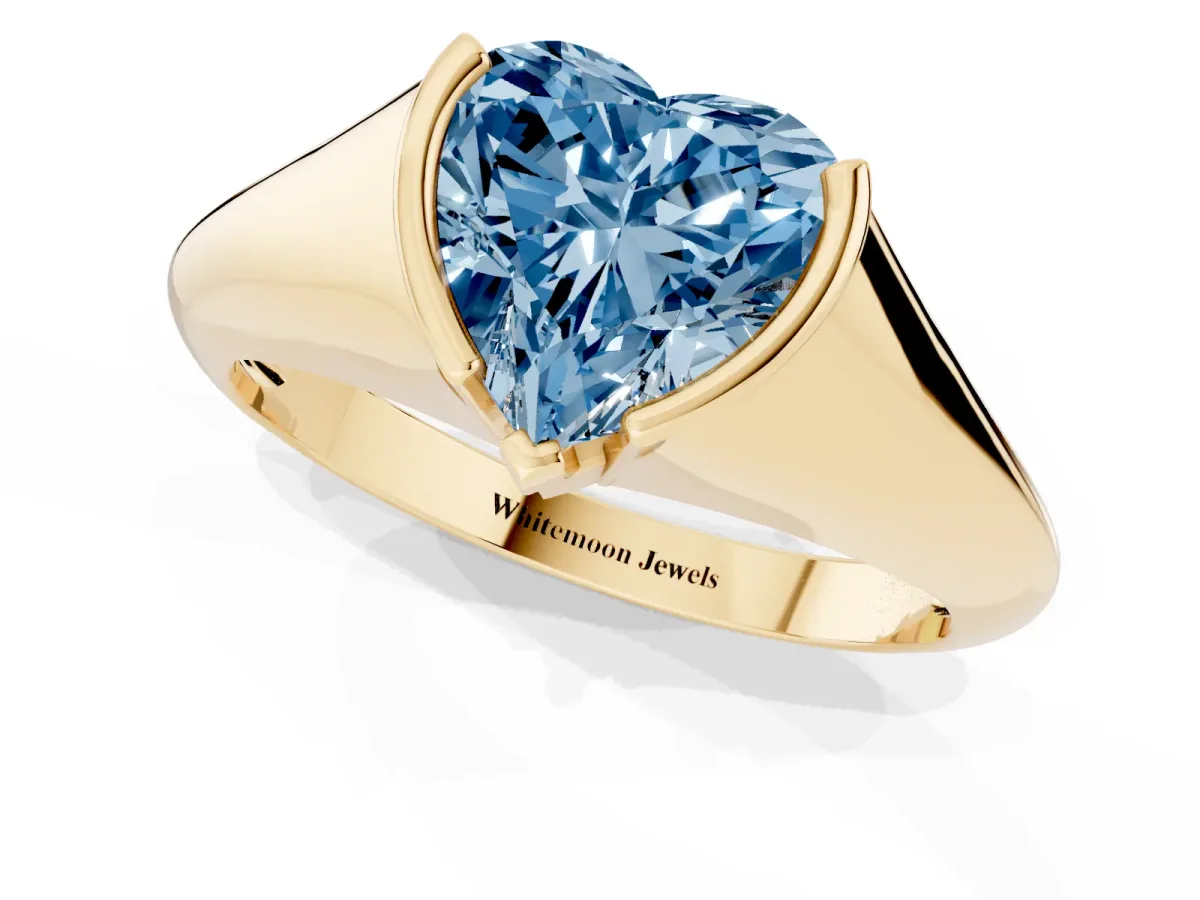 Fancy Blue Heart Cut Solitaire Tension Set Diamond Ring Yellow gold
