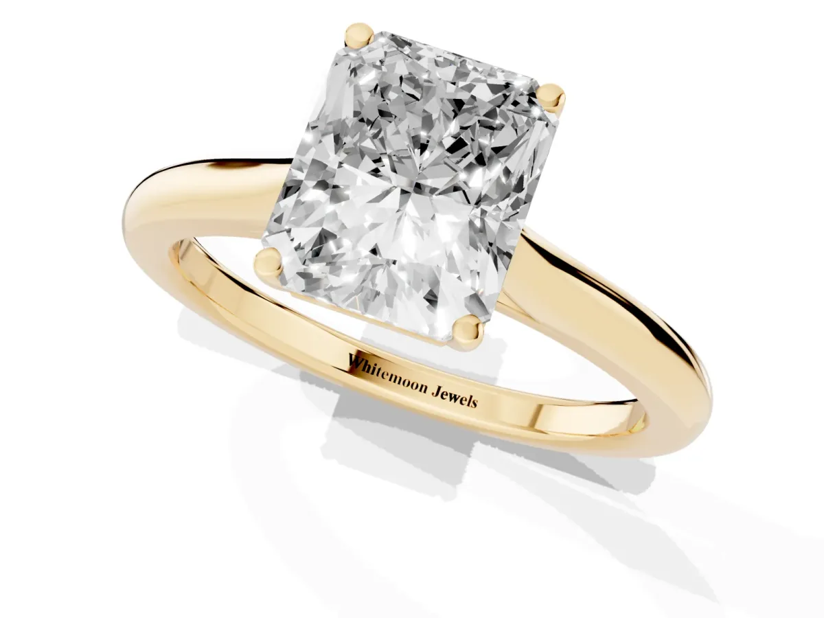 Radiant Cut Cut Solitaire Ring with Cathedral Band and Four-Prong Setting Yellow gold
