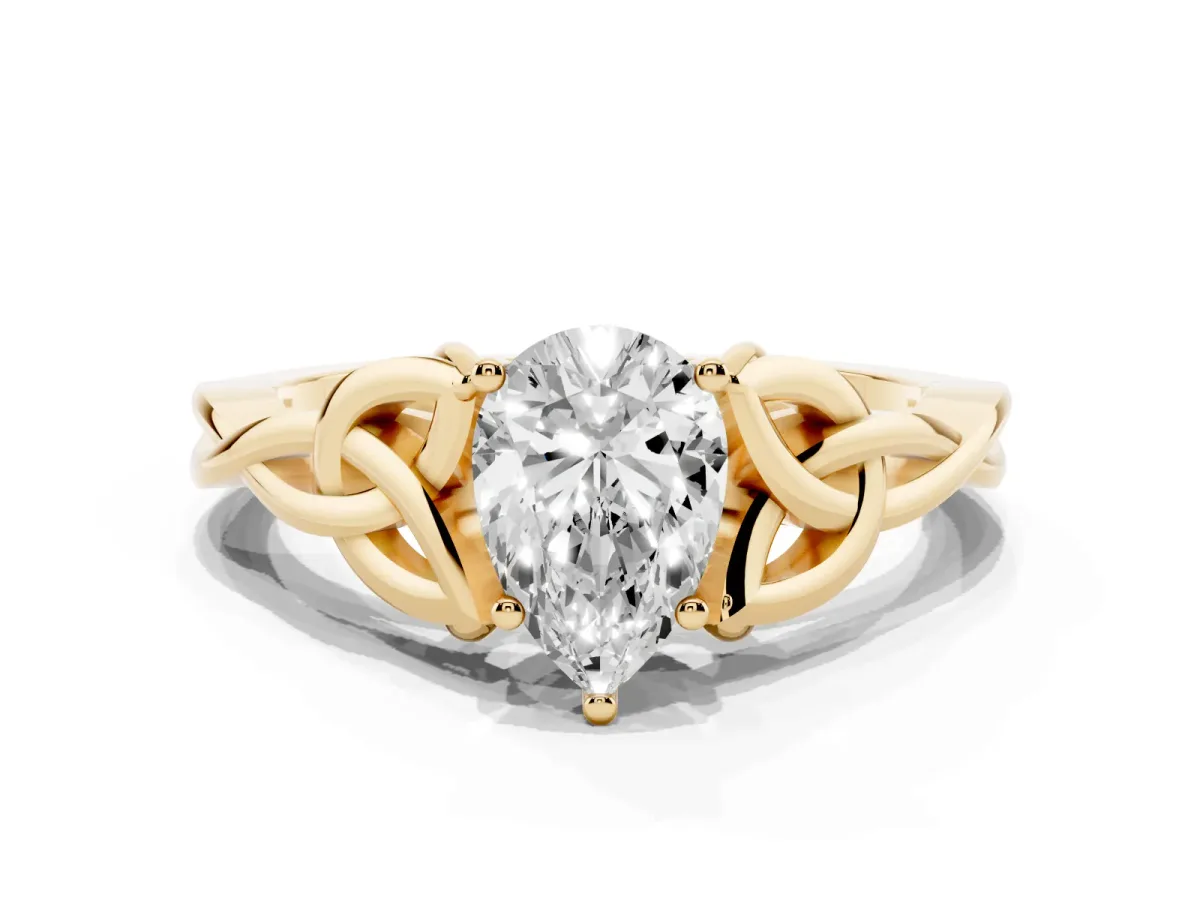 Pear Cut Diamond Solitaire Engagement Ring with Celtic Knot Band and Four-Prong Setting Yellow gold