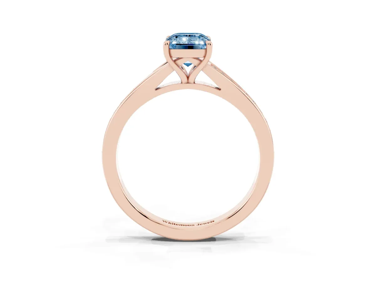 Fancy Blue Emerald Cut Diamond Solitaire Ring with Pavé Band and Prong Setting Rose gold