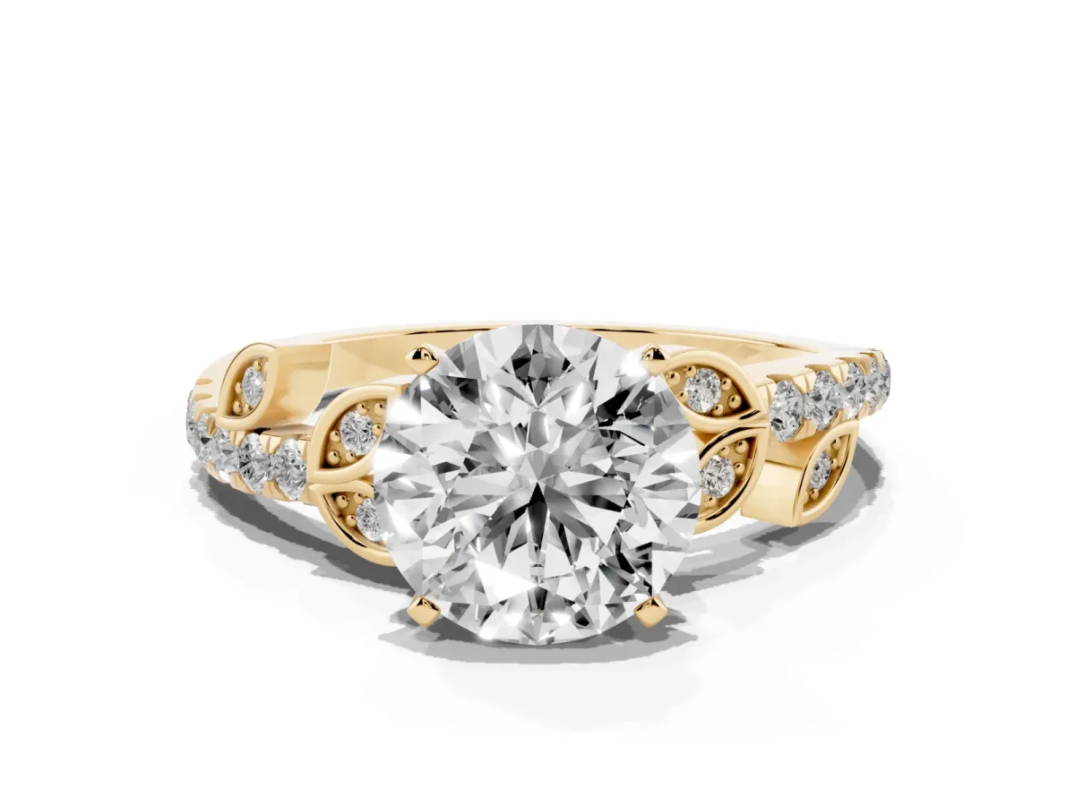 Round Cut Solitaire Leaf-Inspired Diamond Ring with Pavé Band and Four-Prong Setting Yellow gold