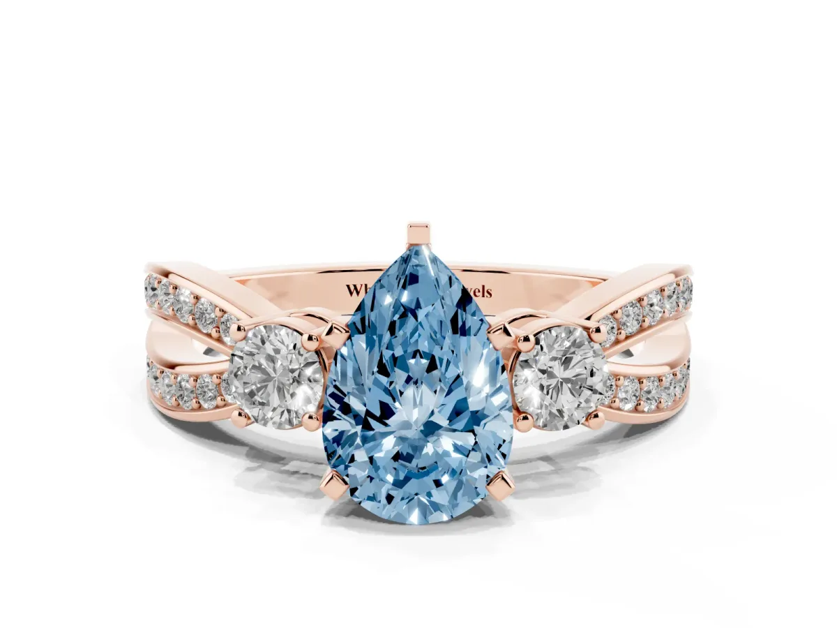 Fancy Blue Three-Stone Pear Cut Cut Diamond Twist Band with Prong Setting Rose gold