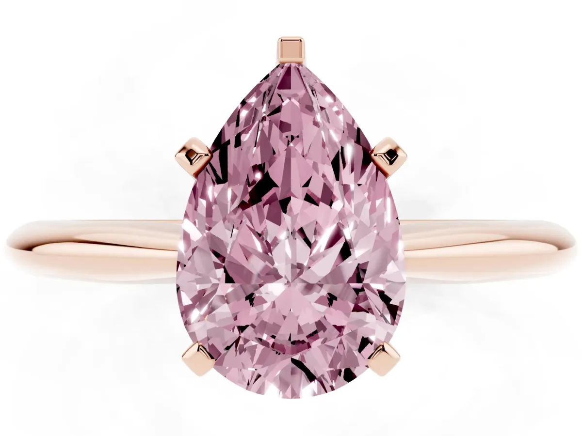 Fancy Pink Pear Cut Cut Solitaire Ring with Four-Prong Setting on a Classic Band Rose gold