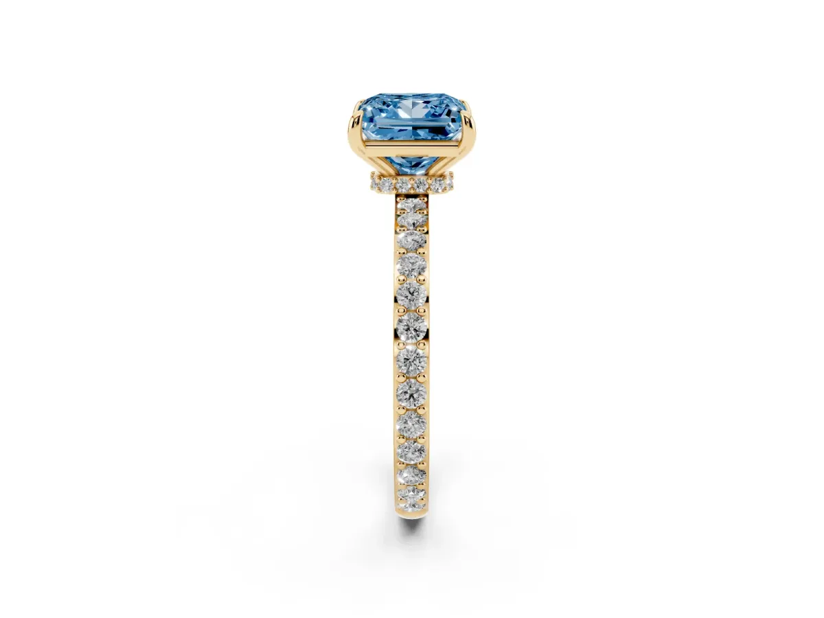 Fancy Blue Princess Cut Diamond Solitaire Engagement Ring with Pavé Band and Four-Prong Setting Yellow gold