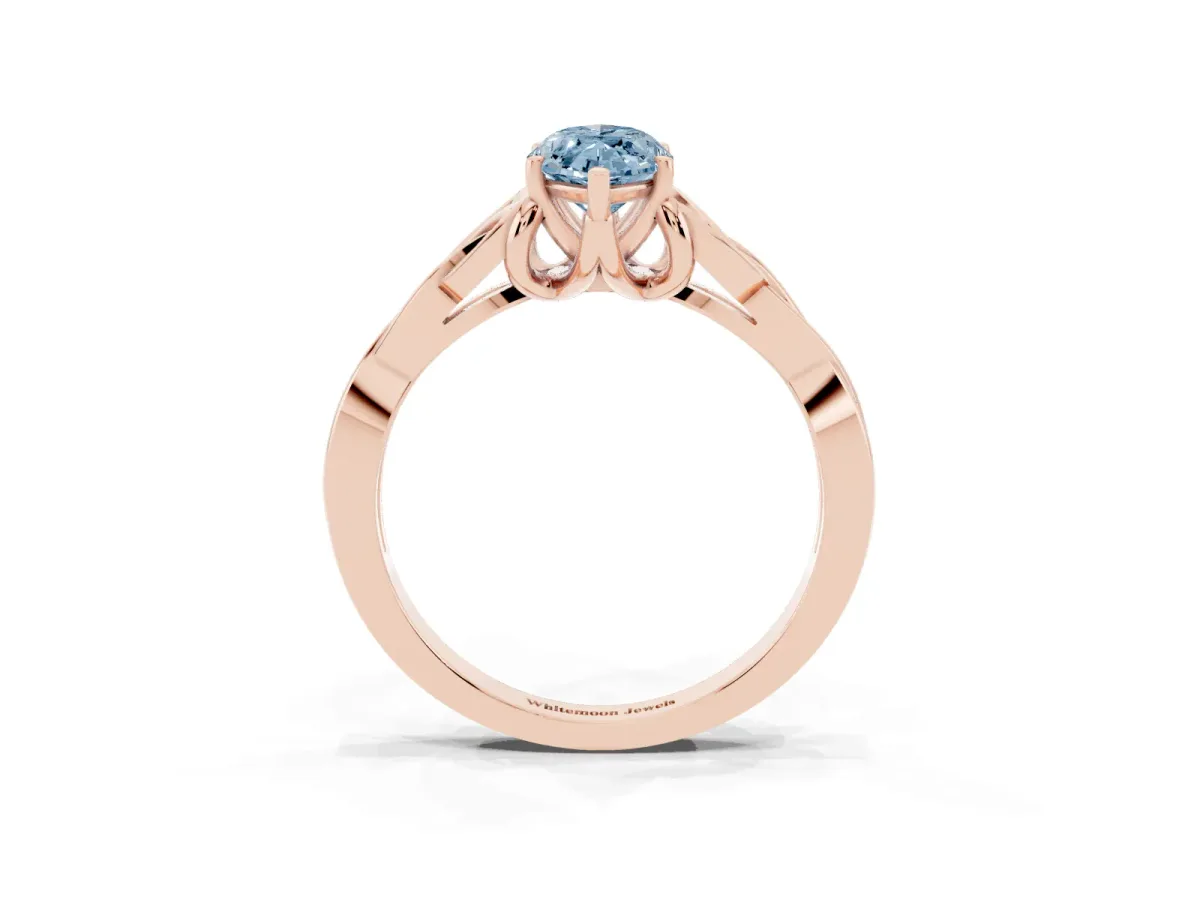 Fancy Blue Marquise Cut Diamond Solitaire Engagement Ring with Celtic Knot Band and Four-Prong Setting Rose gold