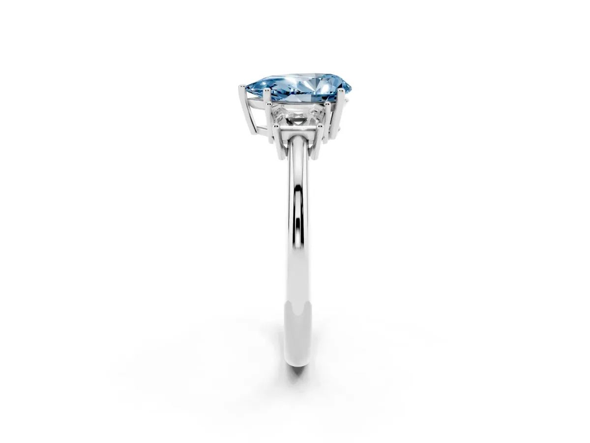 Fancy Blue Pear Cut Diamond Three-Stone Ring with Trapezoid Side Stones and Prong Setting Platinum