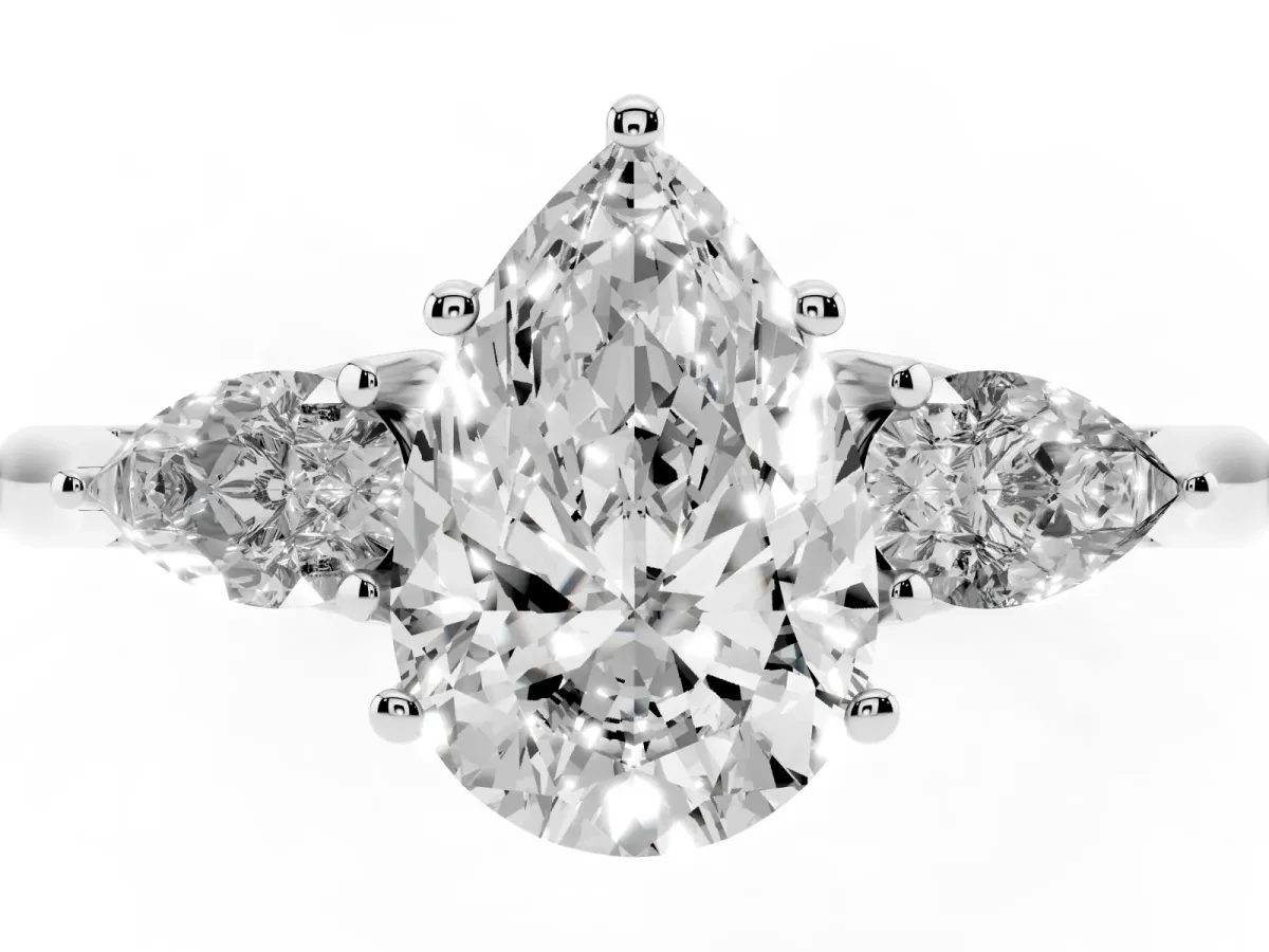 Three-Stone Pear Cut Diamond Ring with Pear Side Stones in Four-Prong Setting Silver