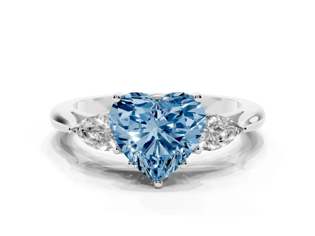 Fancy Blue Three-Stone Heart Cut Diamond Ring with Pear Side Stones in Four-Prong Setting Silver