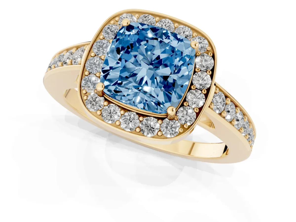 Fancy Blue Cushion Cut Halo Pavé Diamond Engagement Ring with Bezel Setting Yellow gold