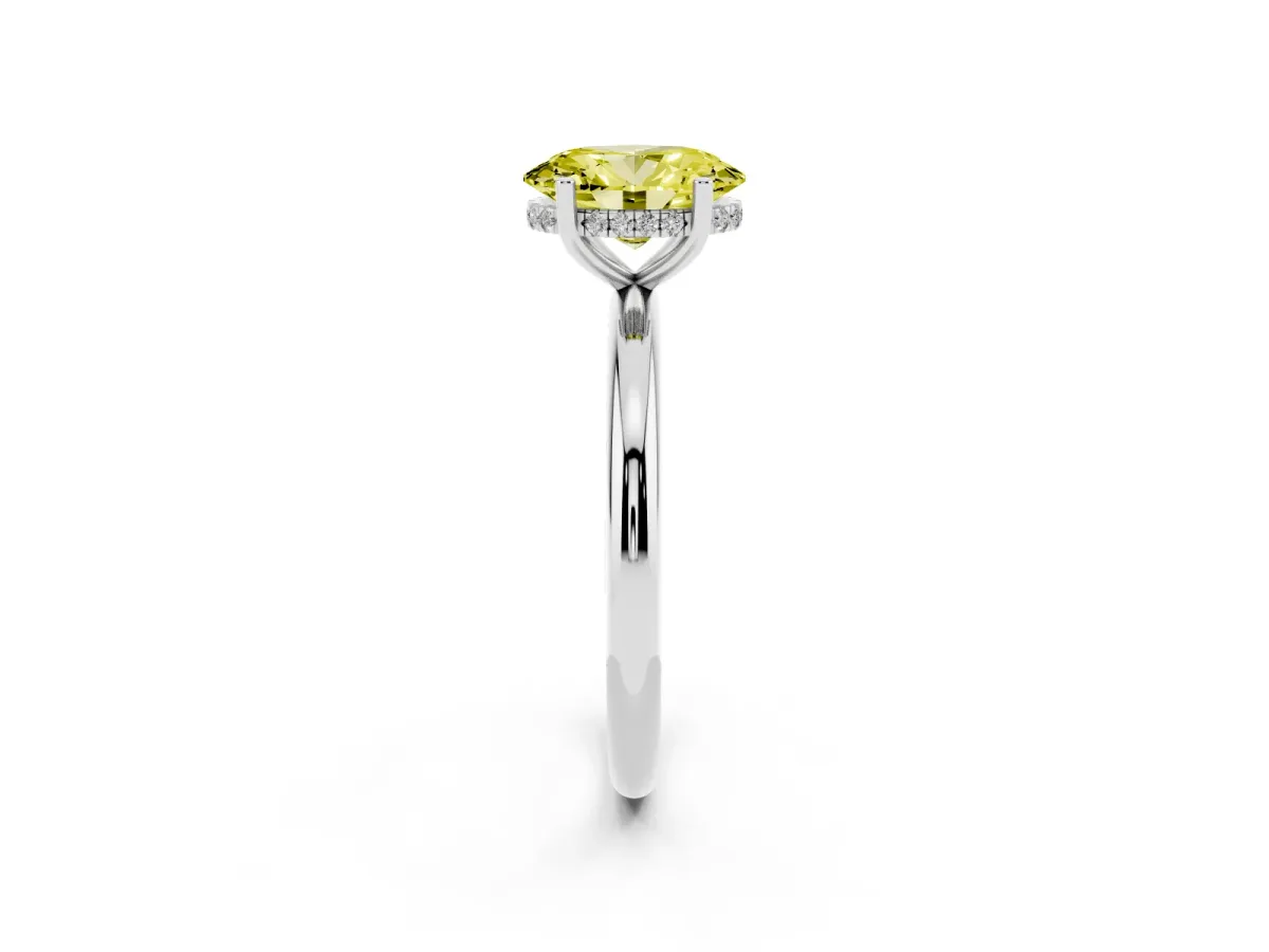 Fancy Yellow Oval Cut Cut Solitaire Engagement Ring with Four-Prong Setting and Classic Band Silver