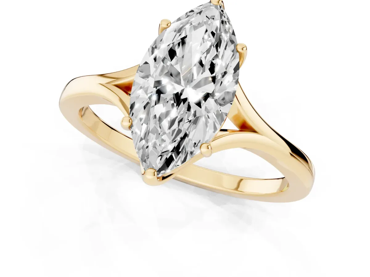 Marquise Cut Solitaire Diamond Ring with Six-Prong Setting and Tapered Band Yellow gold