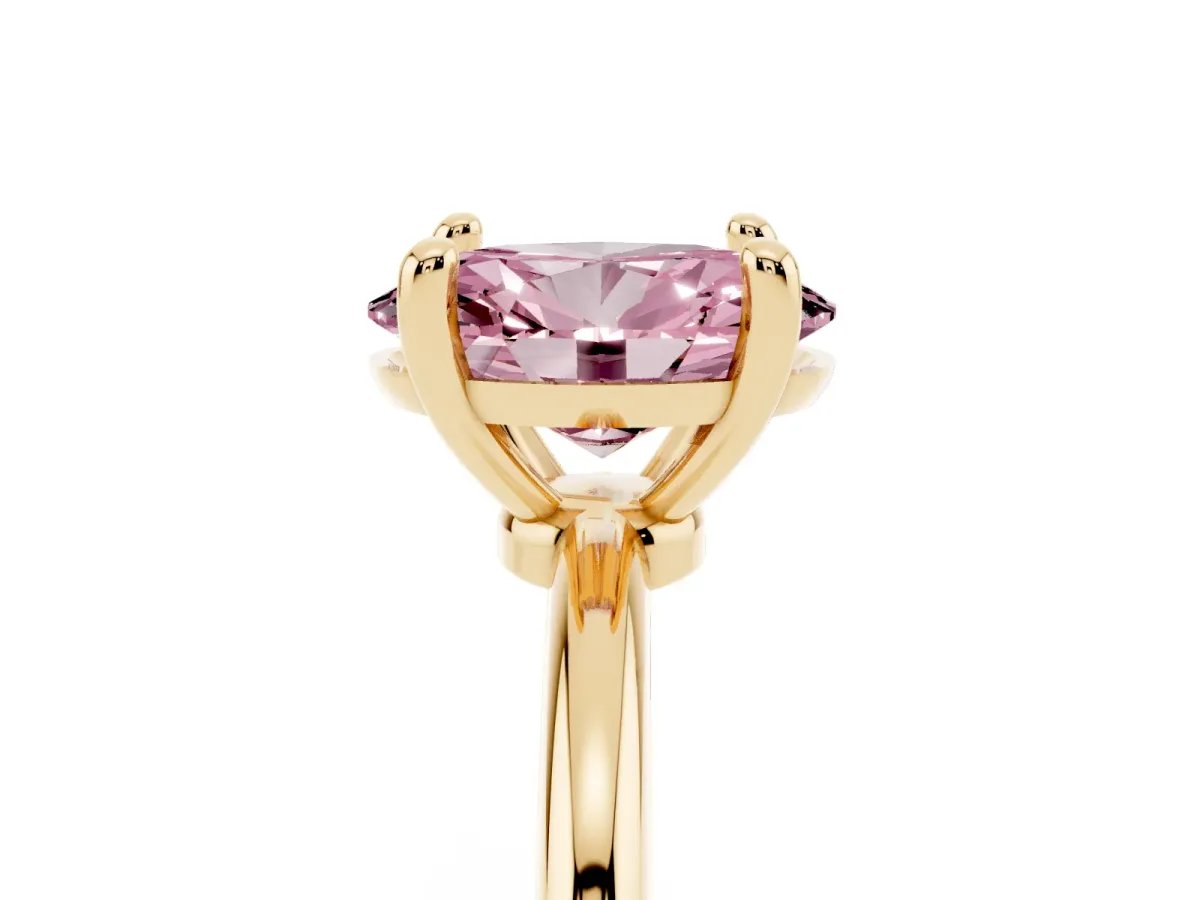 Fancy Pink Oval Cut Solitaire Diamond Ring with 4-Prong Setting on a Classic Band Yellow gold