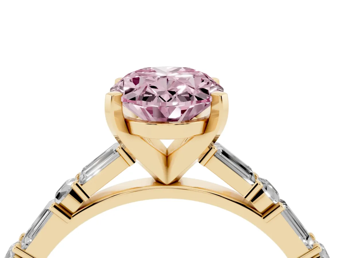 Fancy Pink Oval Cut Diamond Solitaire with Side Baguettes and Channel Set Band Yellow gold