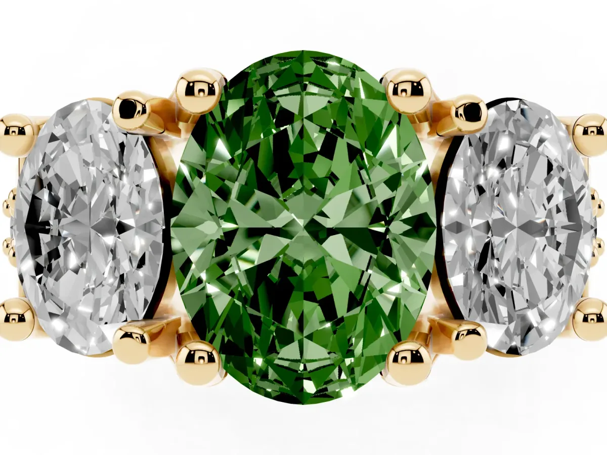 Fancy Green Oval Cut Diamond Three-Stone Ring with Channel Set Band and Four-Prong Setting Yellow gold