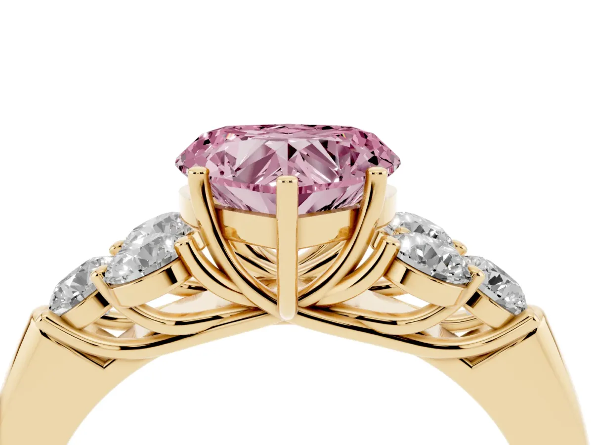 Fancy Pink Heart Cut Cut Diamond Cluster Ring with Round Accent Stones and Prong Setting on a Classic Band Yellow gold
