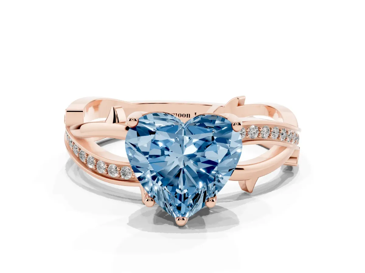 Fancy Blue Heart Cut Solitaire Twist Band with Pavé Accents and Four-Prong Setting Rose gold