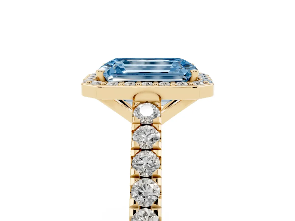 Fancy Blue Emerald Cut Cut Halo Diamond Engagement Ring with Pave Band and Four-Prong Setting Yellow gold