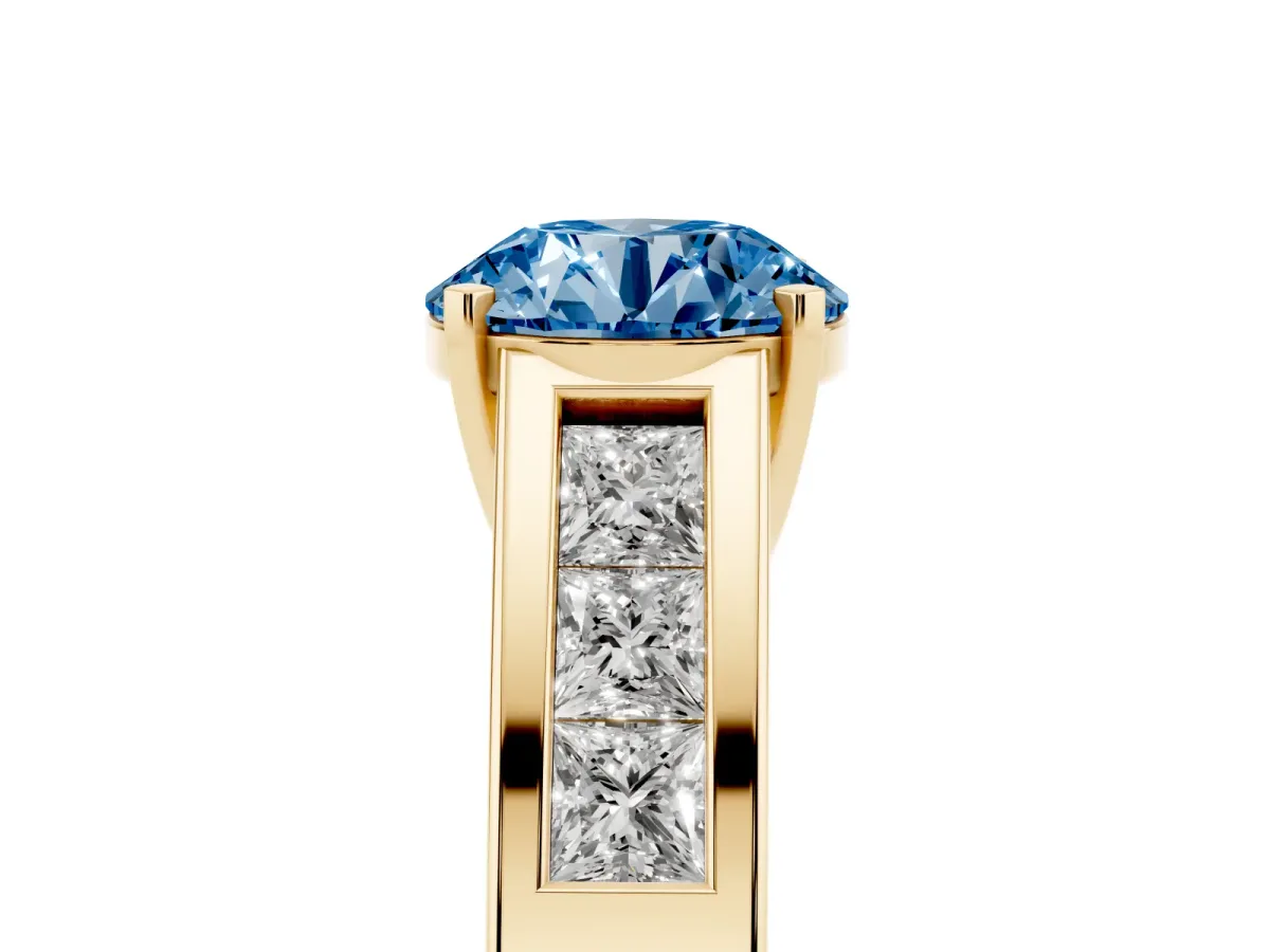Fancy Blue Round Cut Cut Channel Set Solitaire Ring with Four-Prong Setting Yellow gold