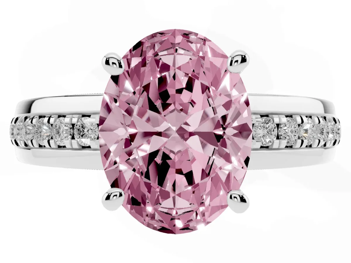 Fancy Pink Oval Cut Solitaire Diamond Ring with Channel Set Band and Six-Prong Setting Silver