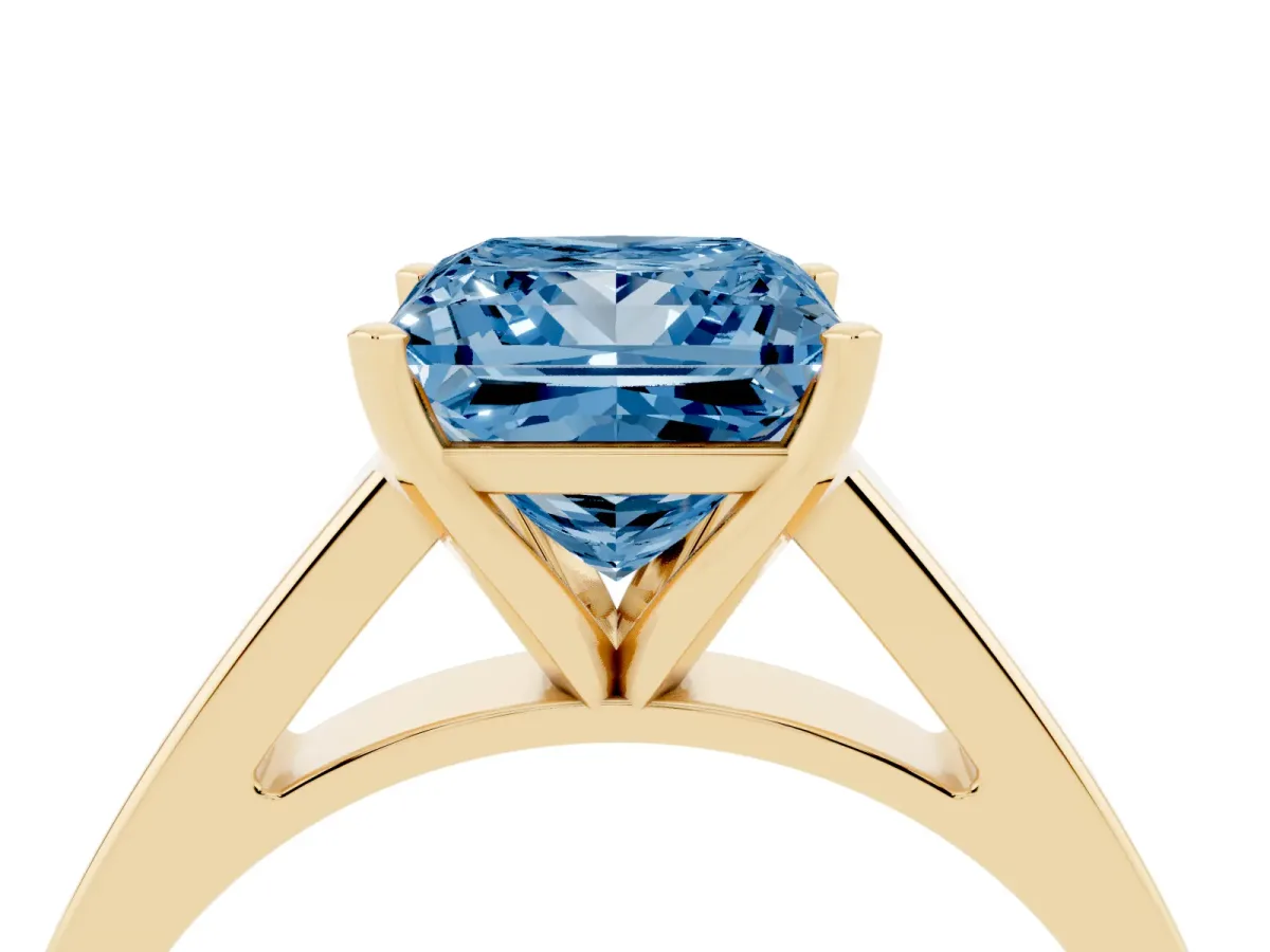 Fancy Blue Princess Cut Solitaire Engagement Ring with Four-Prong Setting and Tapered Band Yellow gold