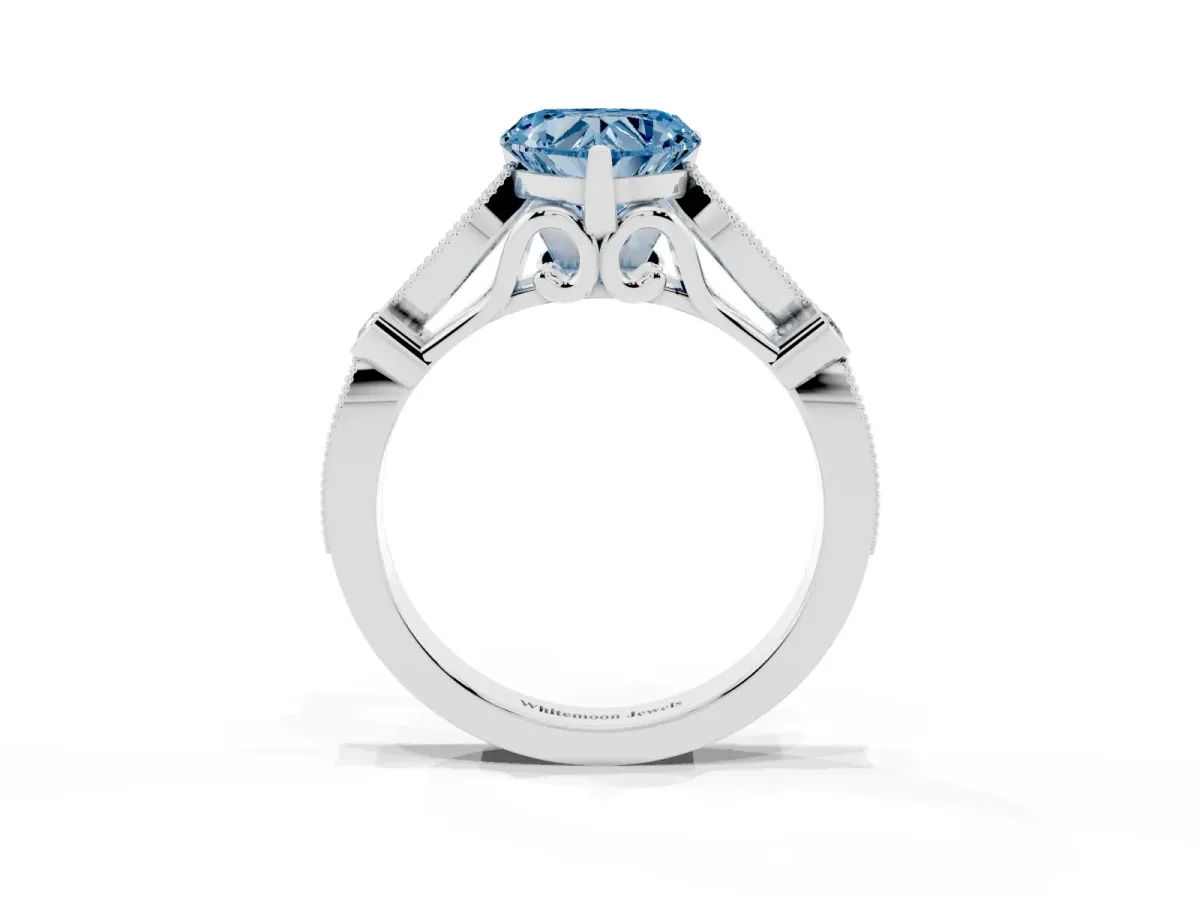 Fancy Blue Heart Cut Cut Diamond with Milgrain Marquise and Bezel Accents on a Solitaire Band with Prong Setting Platinum