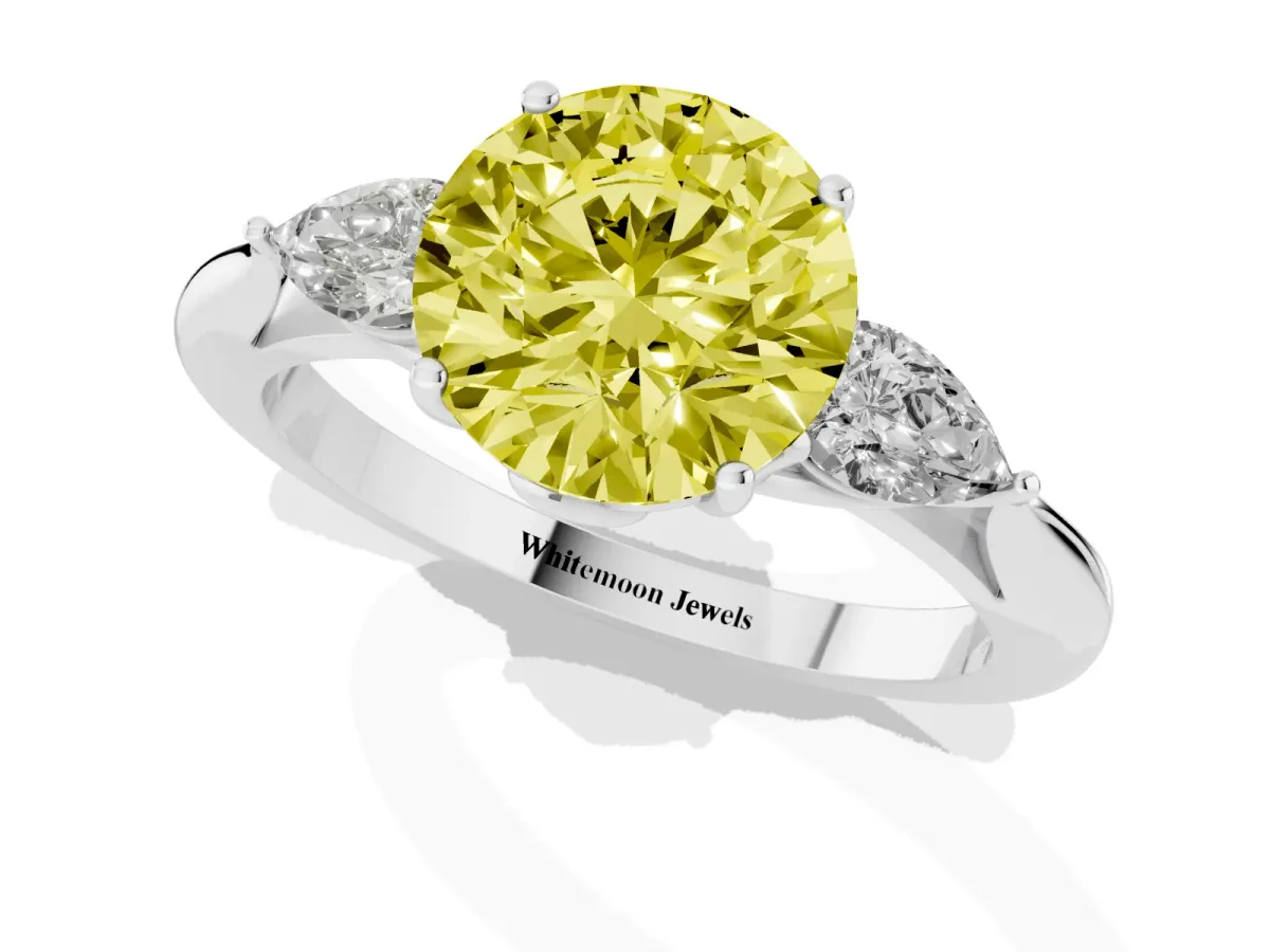 Fancy Yellow Round Cut Diamond Three-Stone Ring with Pear Side Stones and Prong Setting Silver