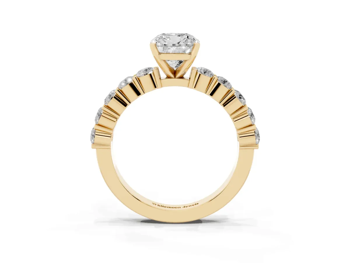 Cushion Cut Diamond Solitaire Ring with Shared Prong Round Side Stones Yellow gold