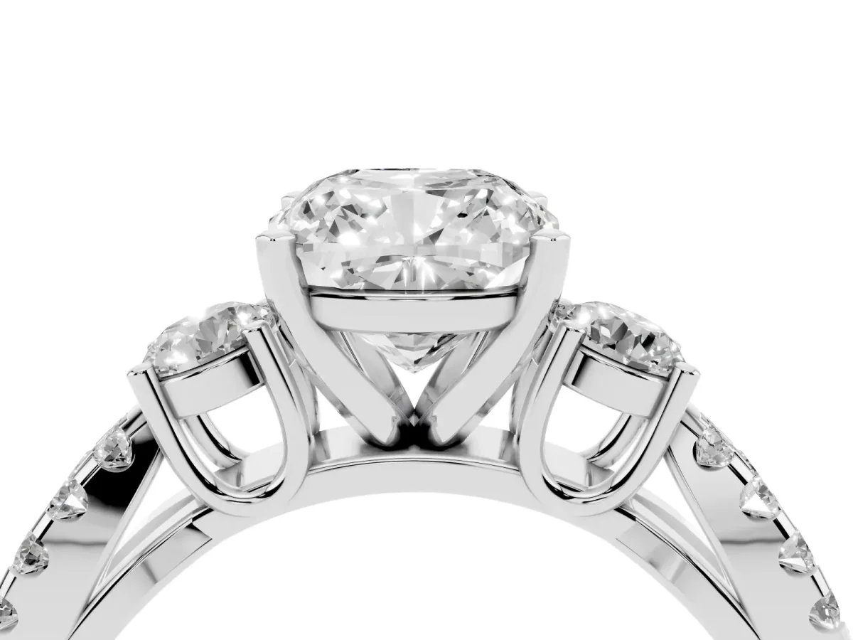 Cushion Cut Diamond Three-Stone Ring with Pavé Split Shank and Four-Prong Setting Silver