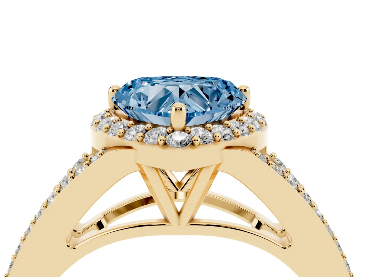 Fancy Blue Heart Cut Halo Split Shank Pave Diamond Ring with Four-Prong Setting Yellow gold