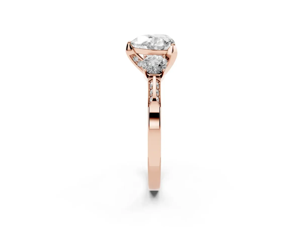 Heart Cut Brilliant Three-Stone Diamond Ring with Pavé Band and Four-Prong Setting Rose gold