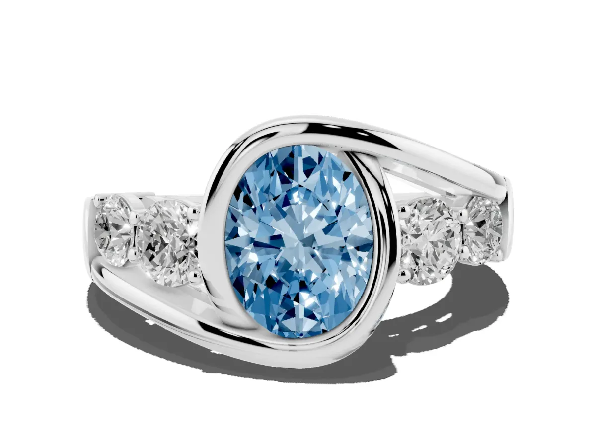 Fancy Blue Bezel Set Oval Cut Diamond Bypass Ring with Round Accents Platinum