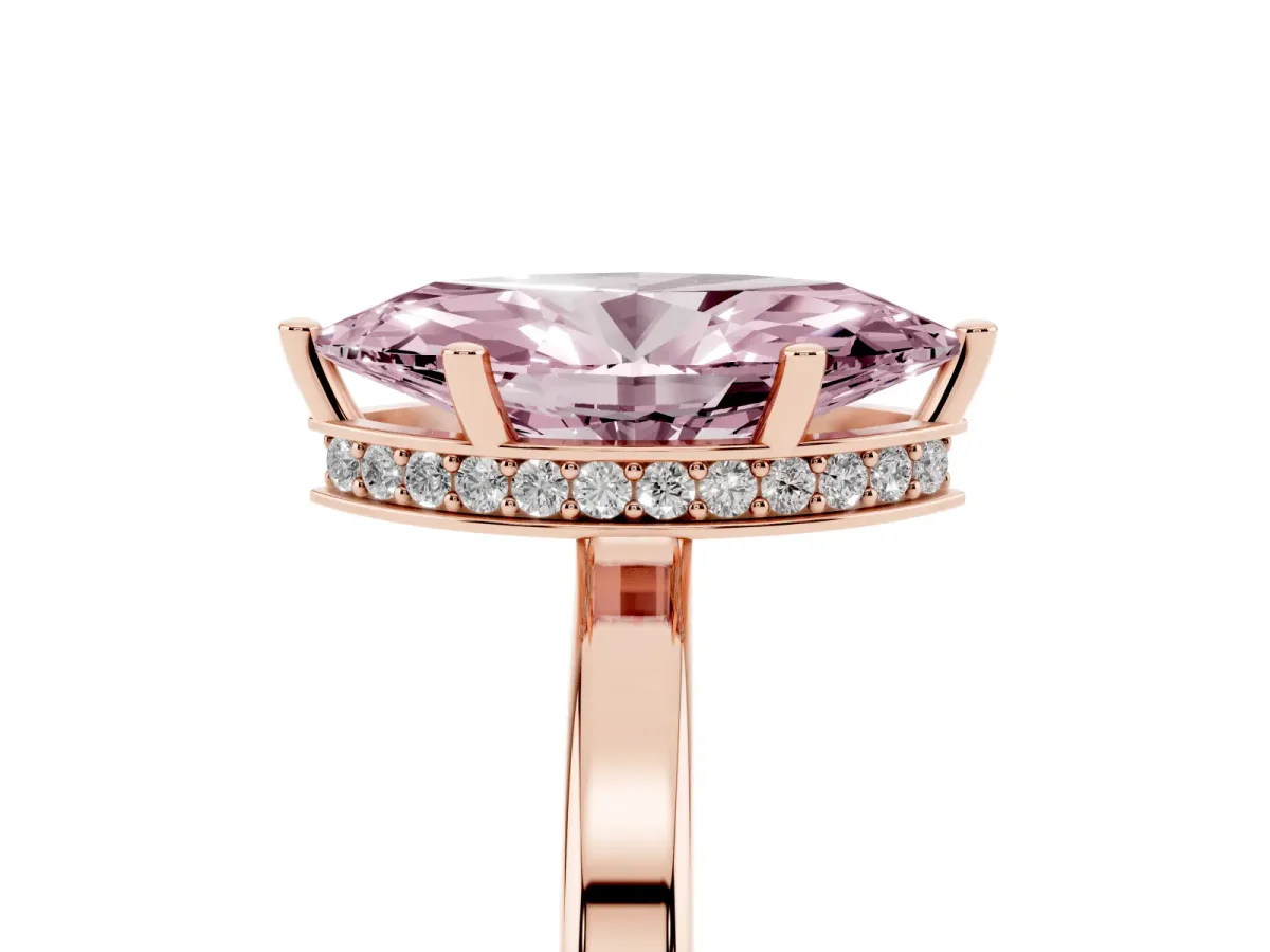 Fancy Pink Marquise Cut Cut Solitaire Engagement Ring with Four-Prong Setting on a Classic Band Rose gold