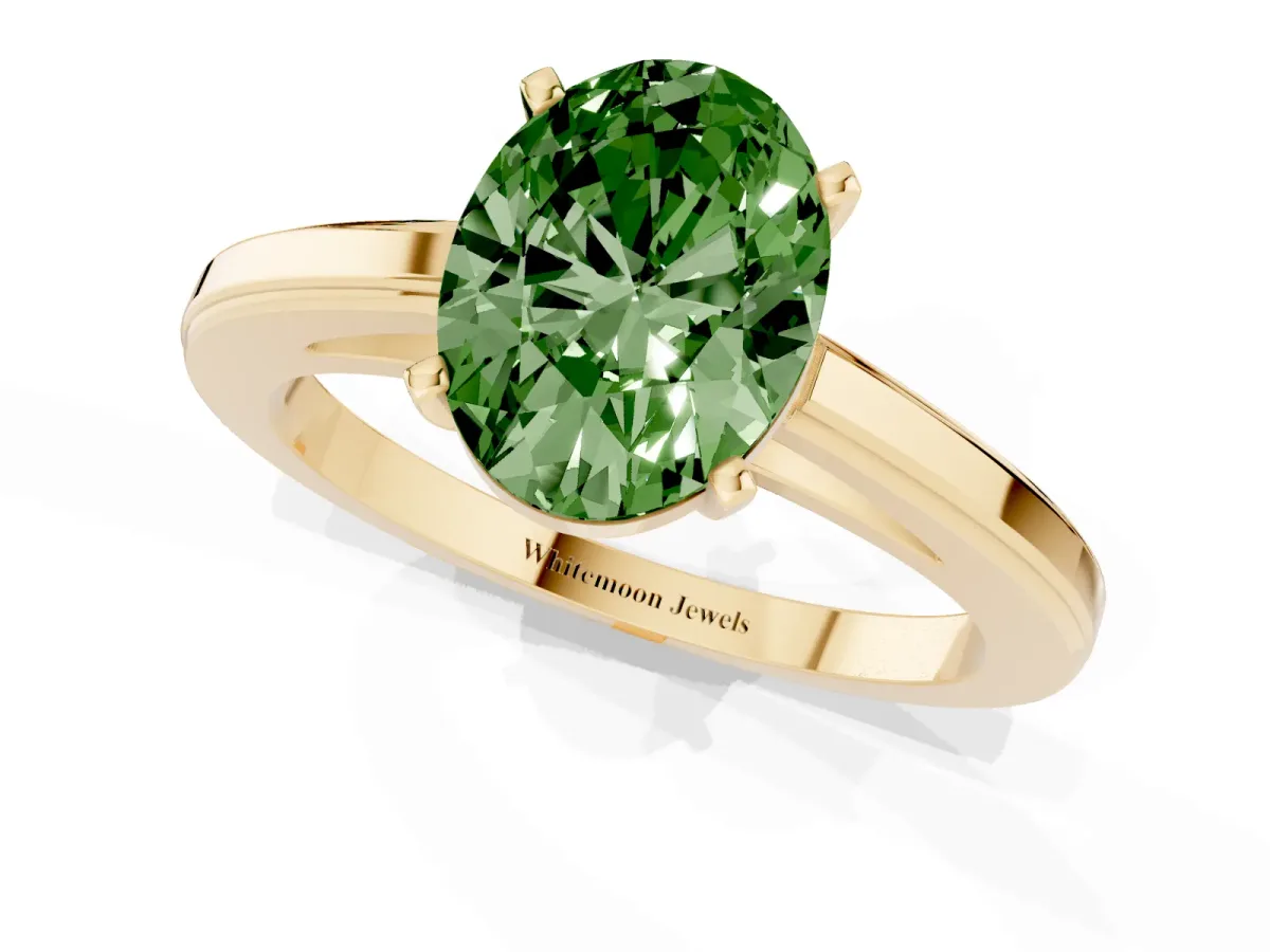 Fancy Green Oval Cut Solitaire Diamond Ring with Four-Prong Setting and Classic Band Yellow gold