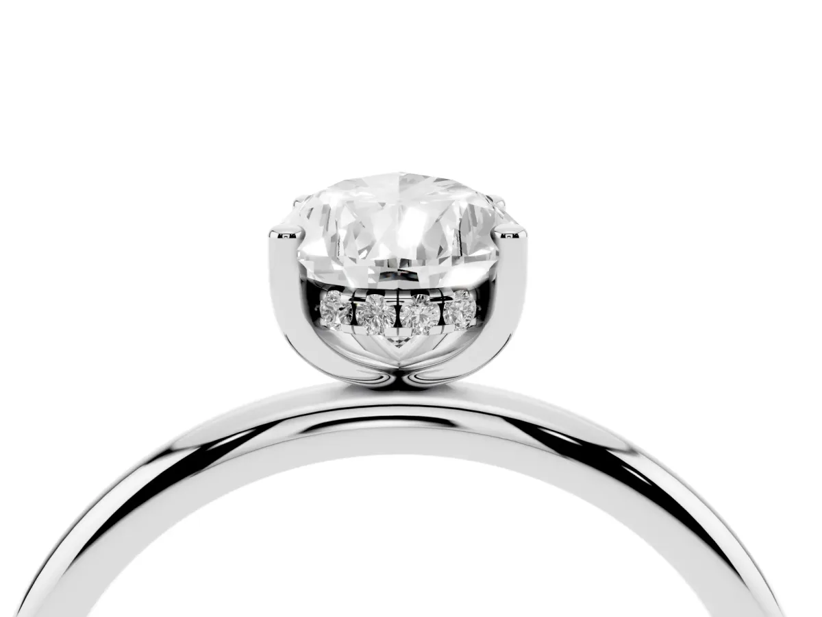 Pear Cut Cut Solitaire Engagement Ring with Four-Prong Setting and Classic Band Silver
