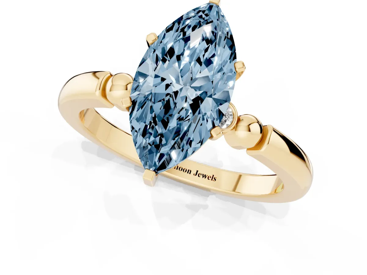 Fancy Blue Marquise Cut Solitaire Beaded Band with Four-Prong Setting Yellow gold