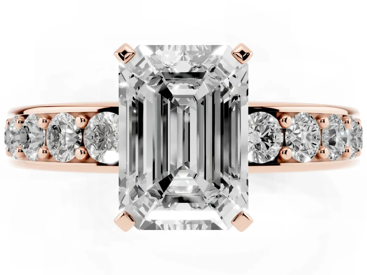 Emerald Cut Diamond Engagement Ring with Channel Set Round Band and Prong Setting Rose gold