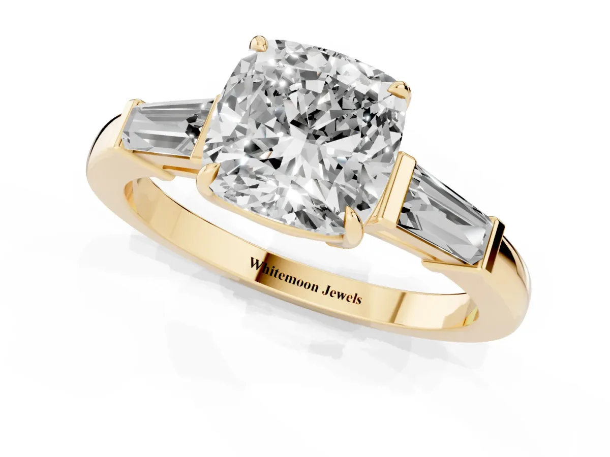 Cushion Cut Diamond Three-Stone Ring with Tapered Baguette Side Stones and Prong Setting Yellow gold