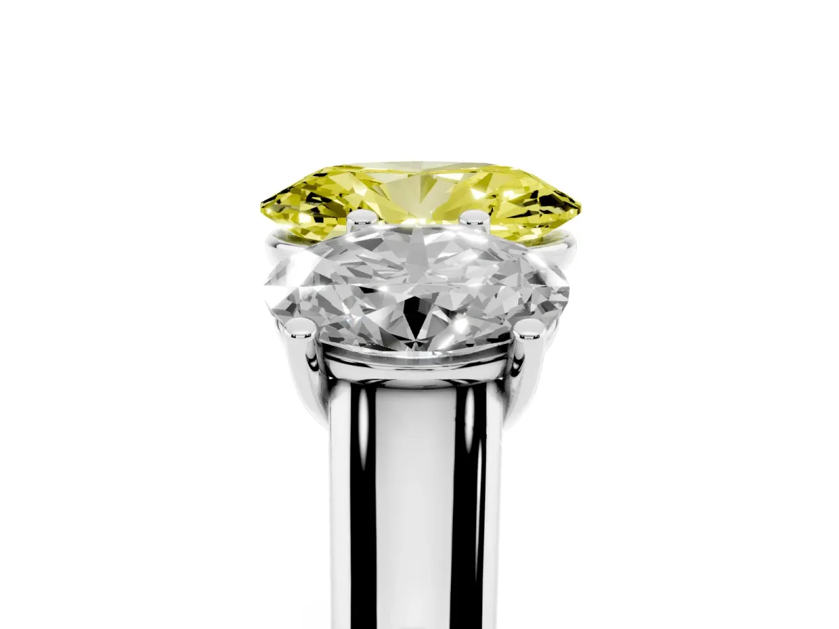 Fancy Yellow Oval Cut Three-Stone Diamond Ring with Prong Setting on a Classic Band Platinum