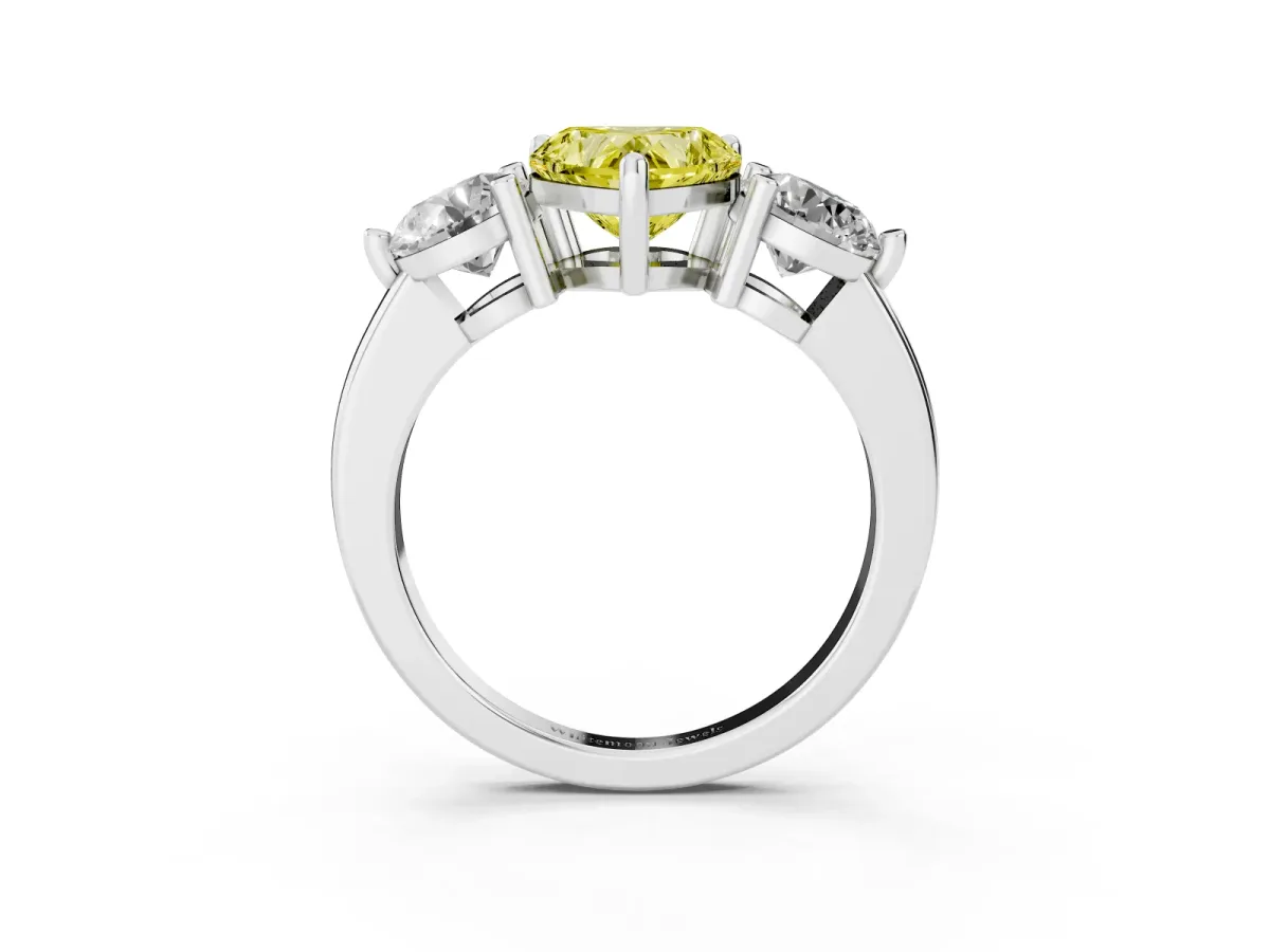 Fancy Yellow Three-Stone Heart Cut Brilliant Cut Solitaire Ring with Prong Setting on a Classic Band Silver