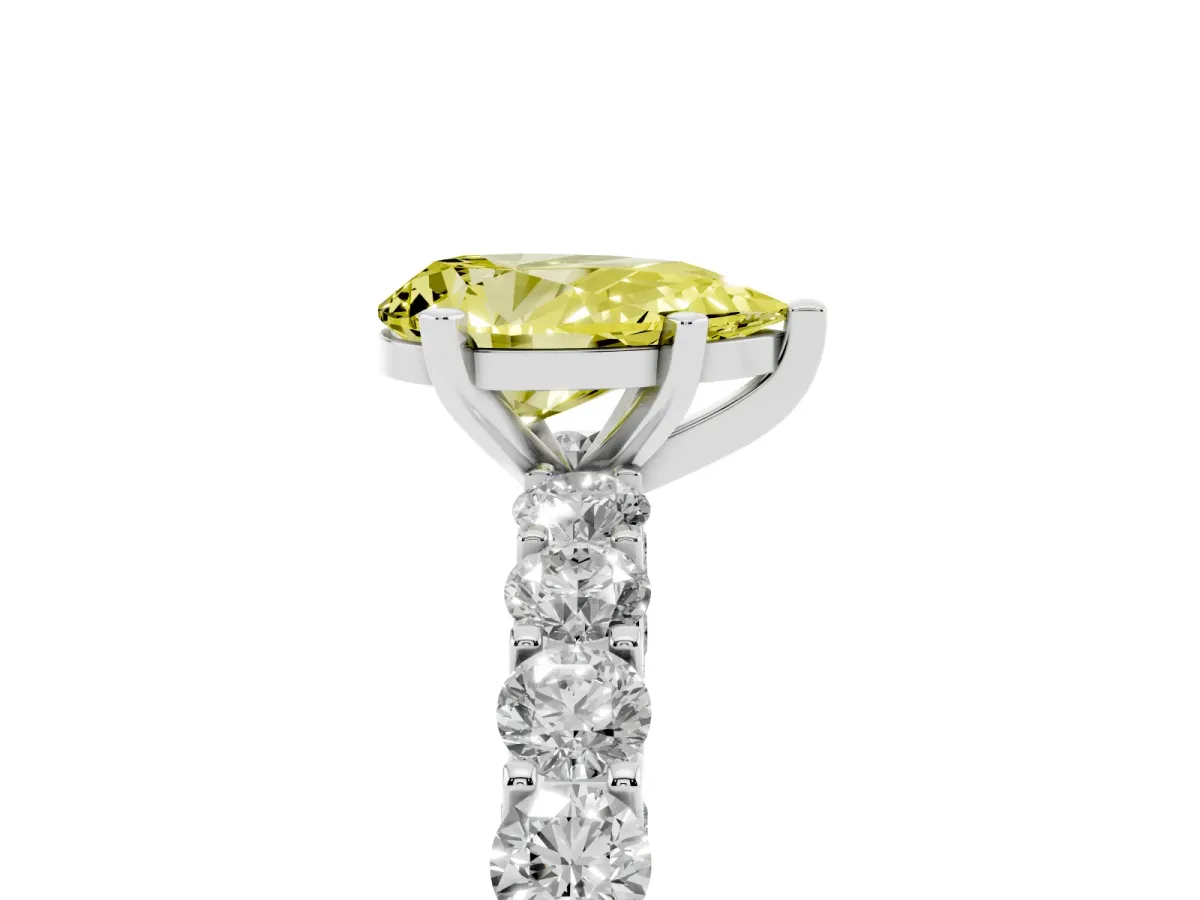 Fancy Yellow Pear Cut Diamond Solitaire Ring with Shared Prong Pavé Band and Four-Prong Setting Silver