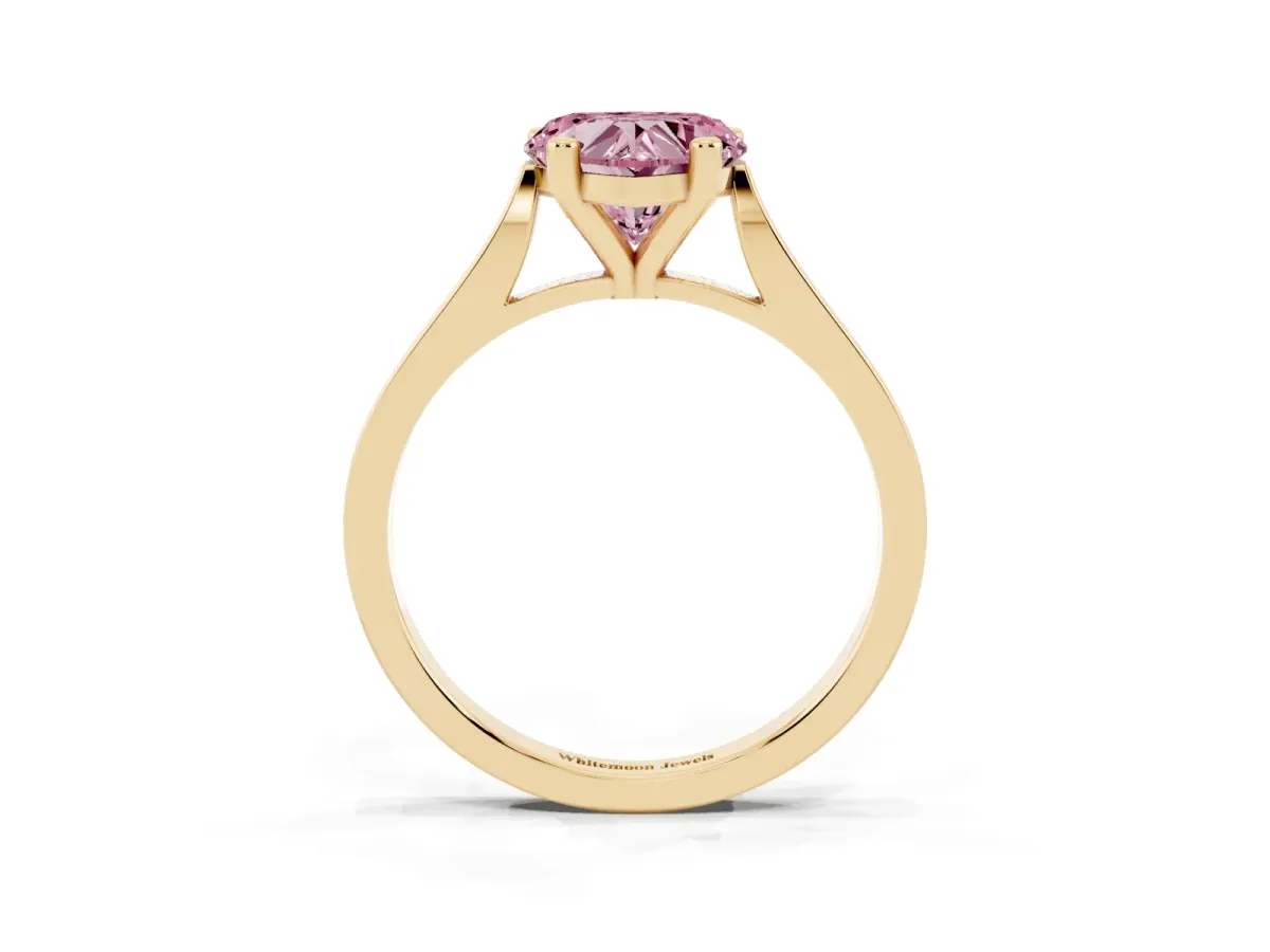 Fancy Pink Heart Cut Solitaire Diamond Ring with Four-Prong Setting and Tapered Band Yellow gold