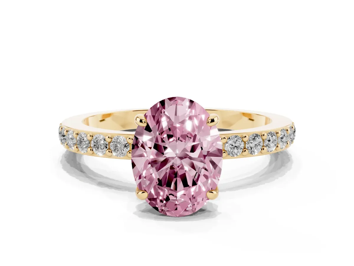Fancy Pink Oval Cut Diamond Pavé Engagement Ring with Round Accents and Prong Setting Yellow gold