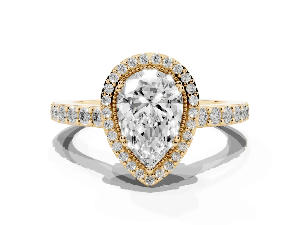Pear Cut Cut Diamond Halo Engagement Ring with Milgrain Detail and Pavé Band Yellow gold