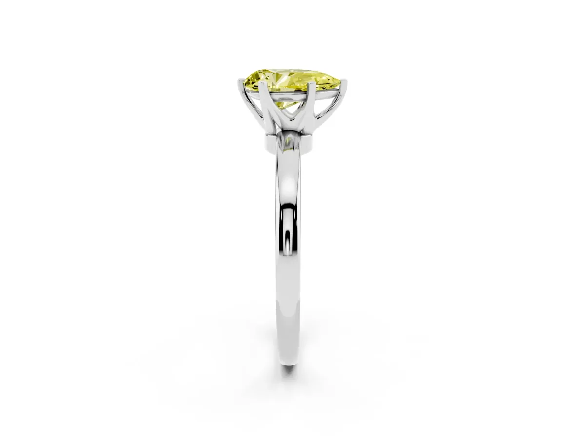 Fancy Yellow Pear Cut Solitaire Diamond Ring with Six-Prong Setting on a Classic Band Silver